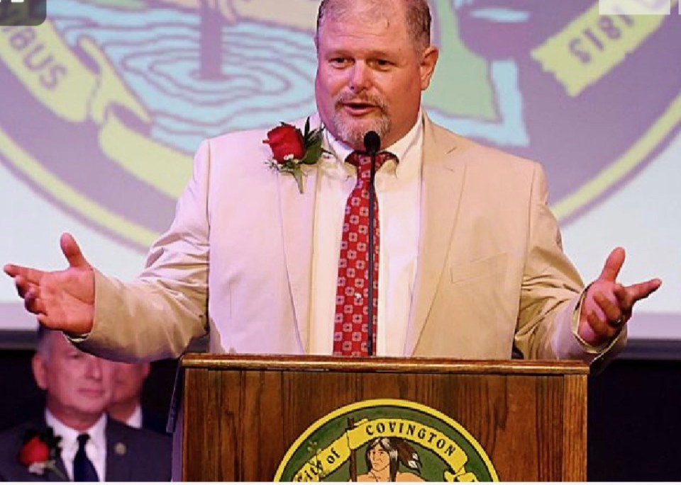 Jimmy Inman speaking at a City of Covington podium